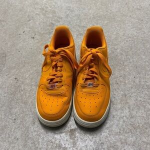 Orange Nike Air Force 1s Size 8 with Halo graphic Nike Symbol (7)